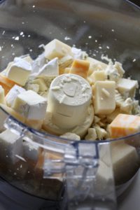 cubes of cheese in a food processor